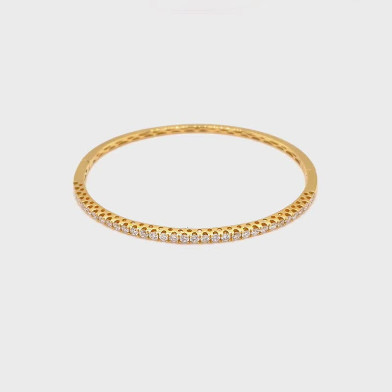 Rhea Bangle in 18k yellow gold with diamonds