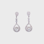 Load and play video in Gallery viewer, Juniper Drop Earrings in 18k white gold with diamonds
