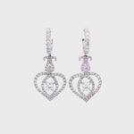 Load and play video in Gallery viewer, Lily Hoop and Dangle Earrings in 18k white gold with diamonds
