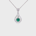 Load and play video in Gallery viewer, Arna Emerald Pendant in 18k white gold with diamonds
